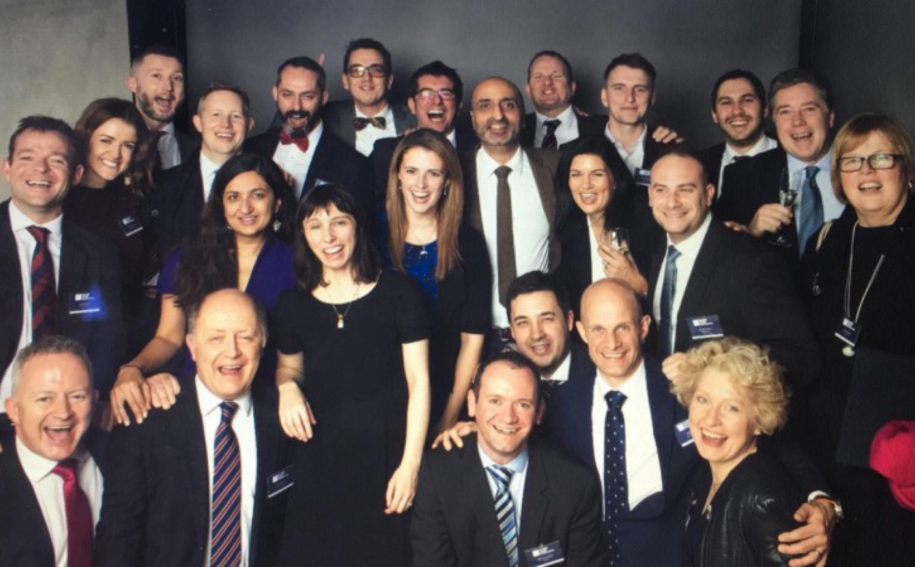 Group of happy Goldman Sachs 10k graduates.